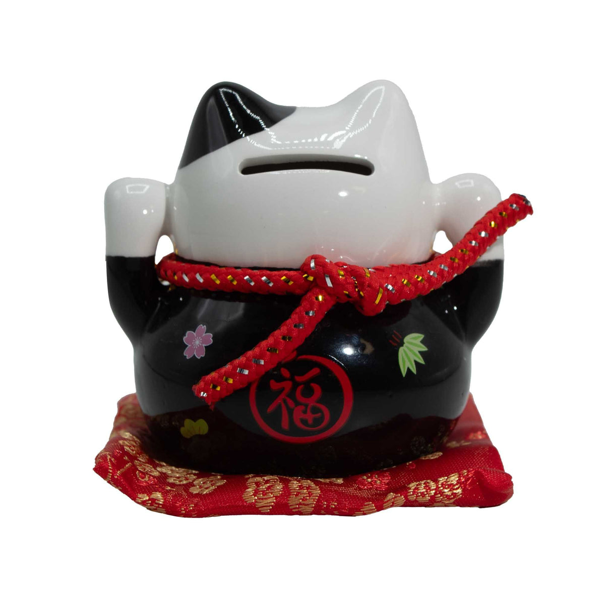 Black ceramic money cat bank showing coin slot and gold detailing